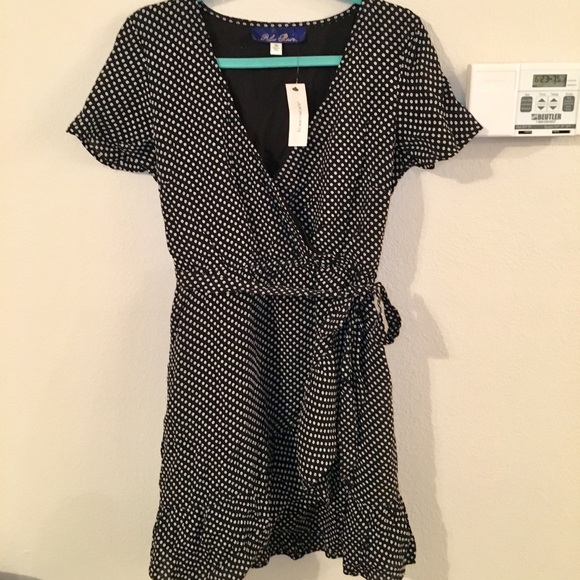 Francesca's Collections Dresses & Skirts - Black Wrap Dress with White Flowers